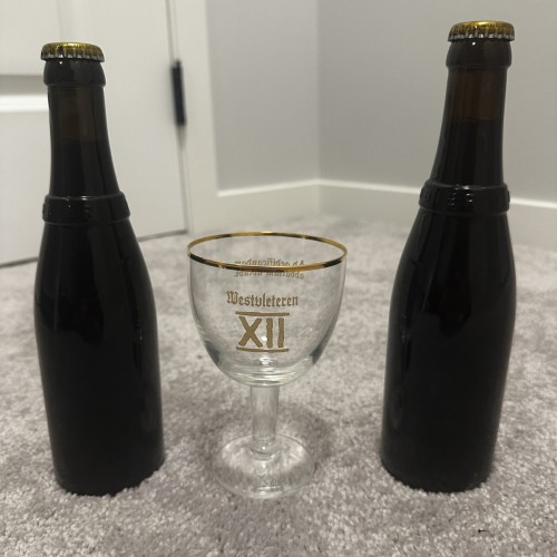 Two Westvleteren 12 . Two different dates and glass