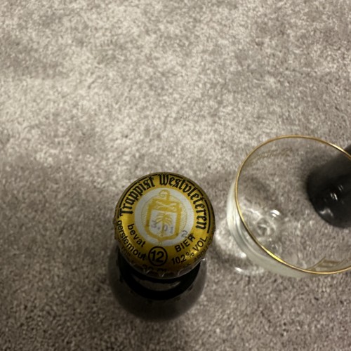 Two Westvleteren 12 . Two different dates and glass